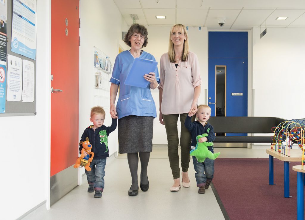  Dr Morag Curnow; with some of her patients, twins Connor and Caleb John, (age 2) and their mum Nicola John.
