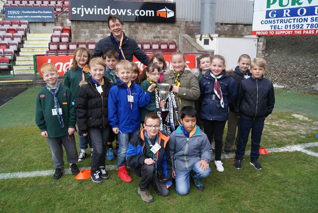Cub scouts hold the league cup at the Dunfermline event
