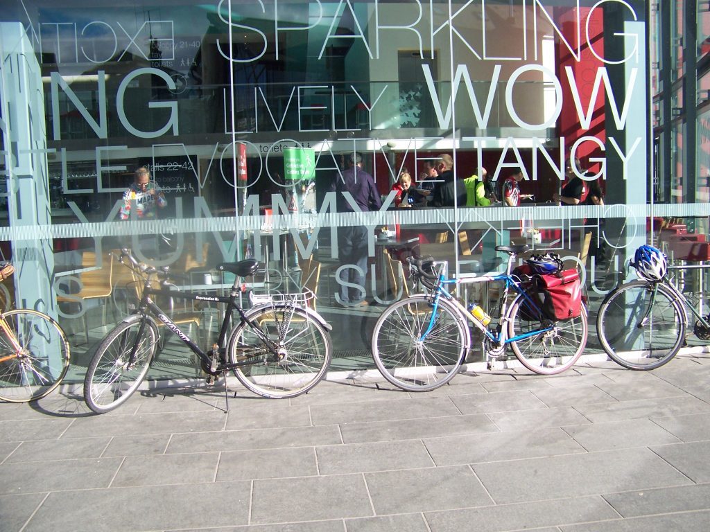 Cycling to work is a great excuse for a coffee stop Courtesey Sustrans