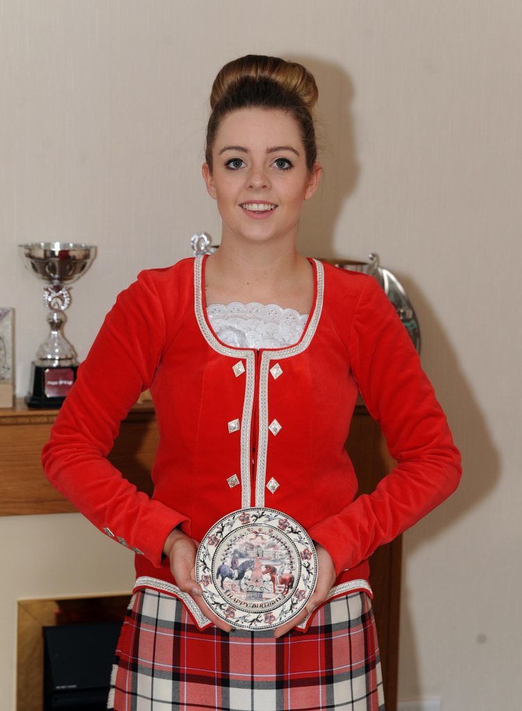 Danielle with a plate she was given to mark her participation in the event.