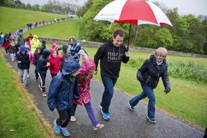 David Seath's brother Gary and mother Libby walking with St Margaret's Primary School pupils.