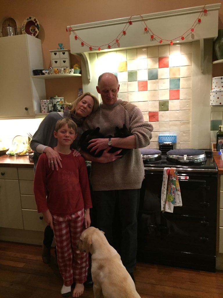 Elizabeth with husband Guy and younger son Bruce, and family pets
