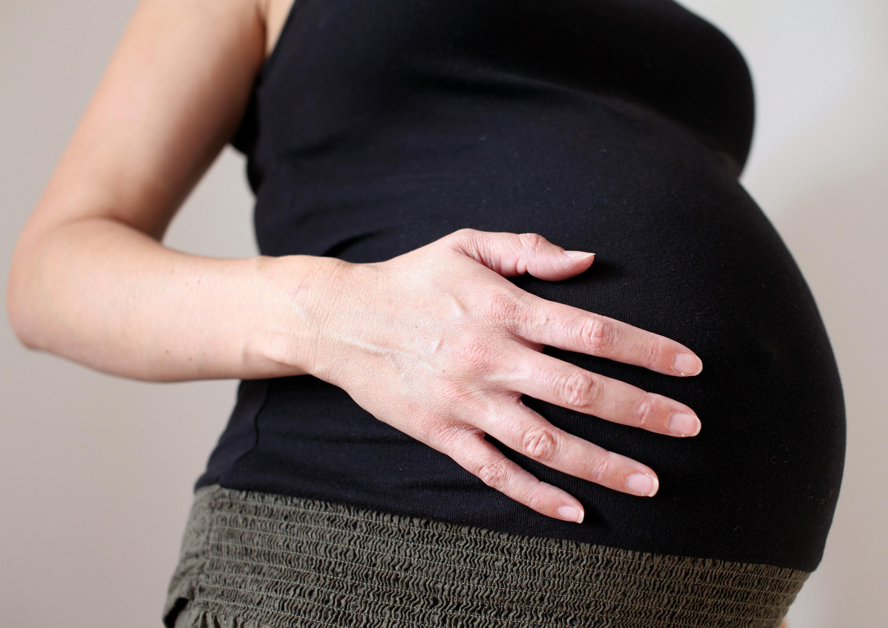 File photo dated 05/09/10 of a pregnant woman, as exposure to air pollution may increase the risk of stillbirth, new research suggests. PRESS ASSOCIATION Photo. Issue date: Wednesday May 25, 2016. Researchers have called for tighter curbs on car exhausts and industrial waste emissions to reduce the risk of air pollutants after their research concluded that exposure to ambient air pollution heightens the risk of stillbirth. See PA story HEALTH Stillbirths. Photo credit should read: Katie Collins/PA Wire