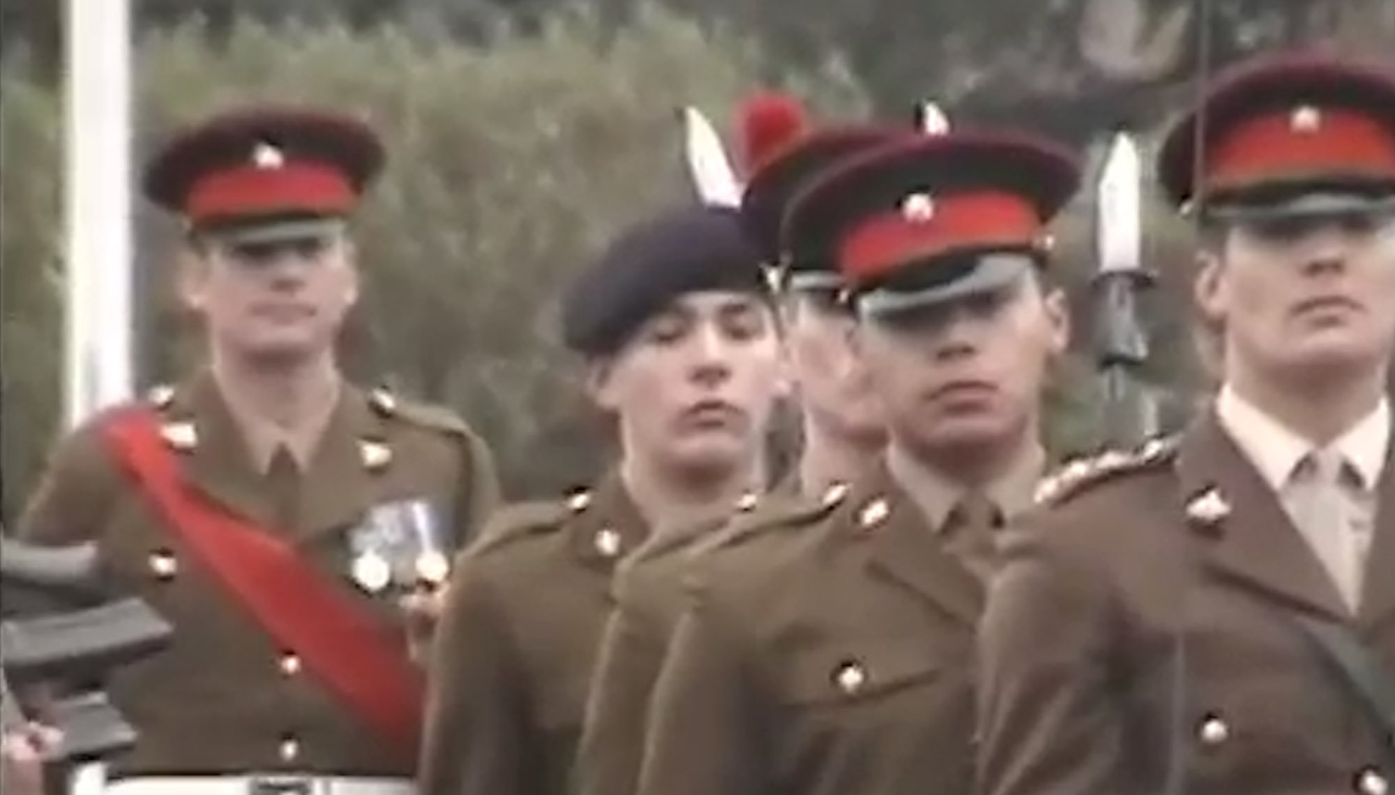 Family video of Fusilier Lee Rigby (centre).