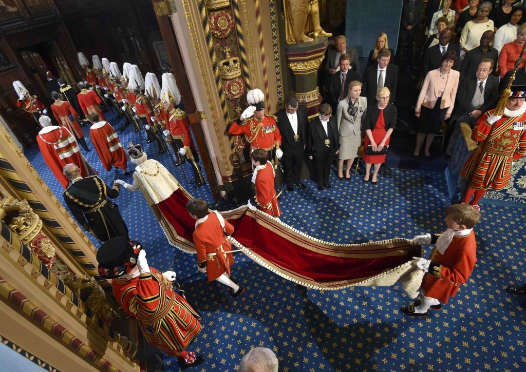 Queen Elizabeth II and the Duke of Edinburgh proceed through the Royal Gallery ahead of the State Opening of Parliament, in the House of Lords at the Palace of Westminster in London. PRESS ASSOCIATION Photo. Picture date: Wednesday May 18, 2016. See PA story POLITICS Speech. Photo credit should read: Toby Melville/PA Wire