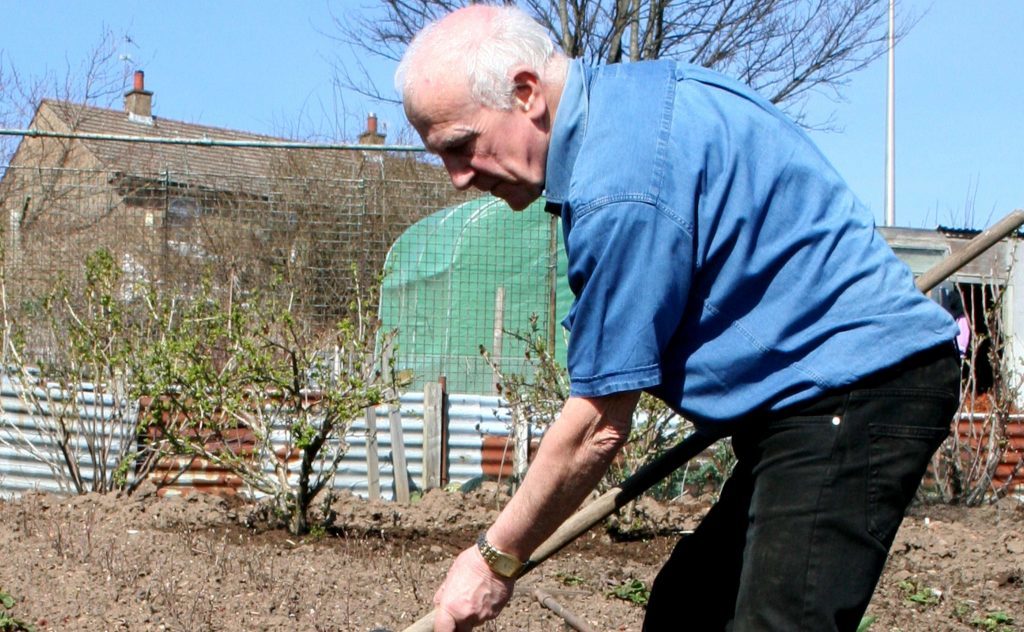 John Stoa at work in the garden