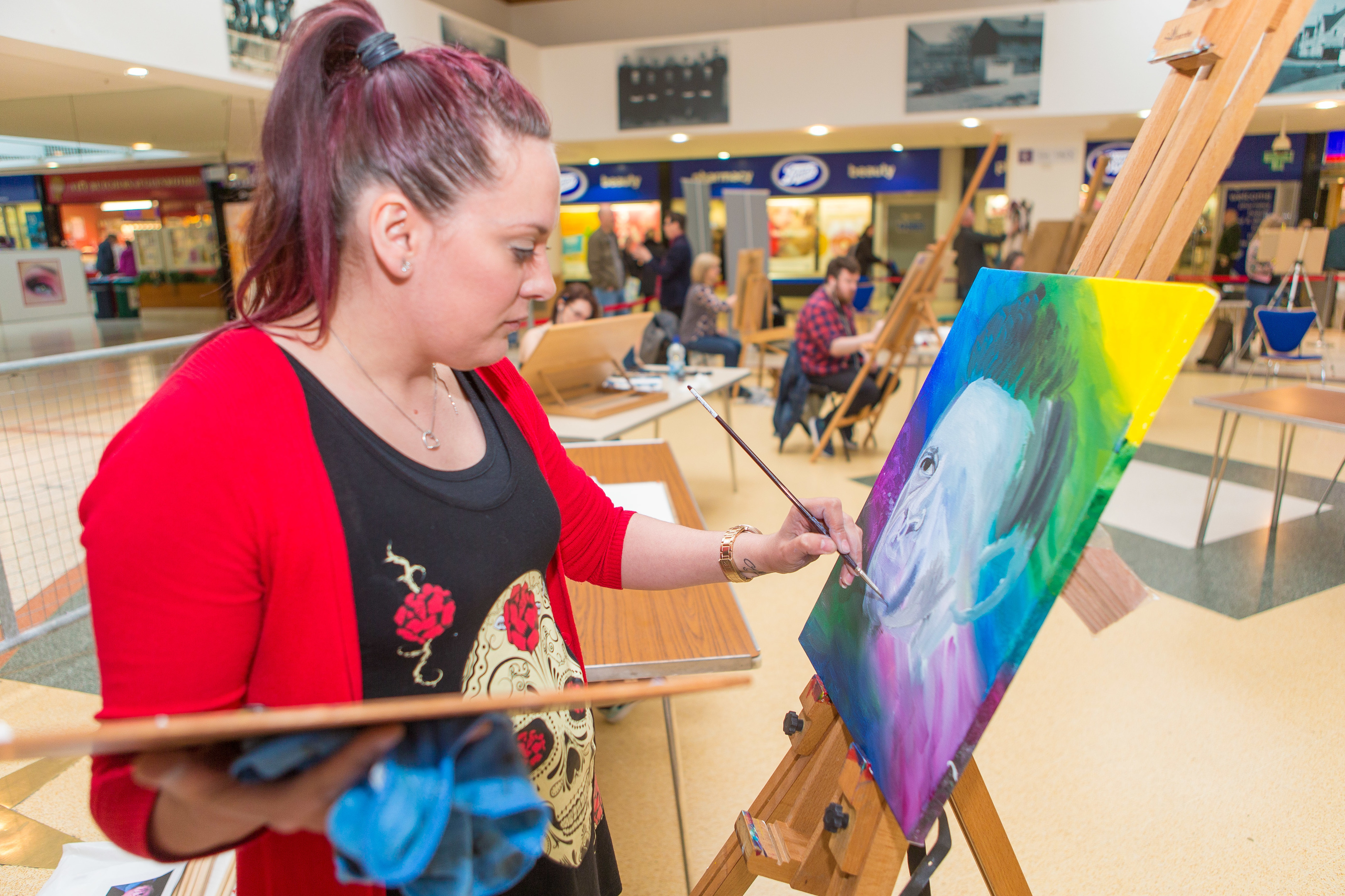 Lynsey Guidi workers on her painting of the music legend.