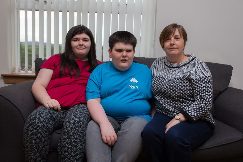 Joe with sister Kerri and Auntie Rose.