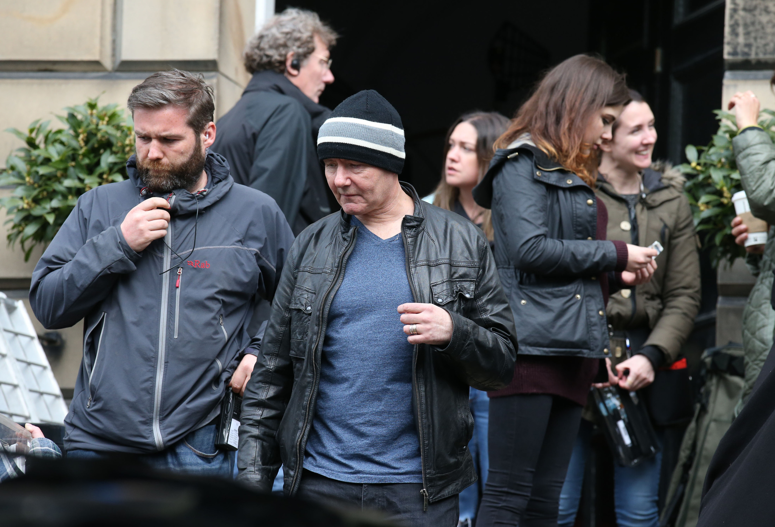 Irvine Welsh (centre) on the set of the film Trainspotting 2 which is currently being filmed in Edinburgh.