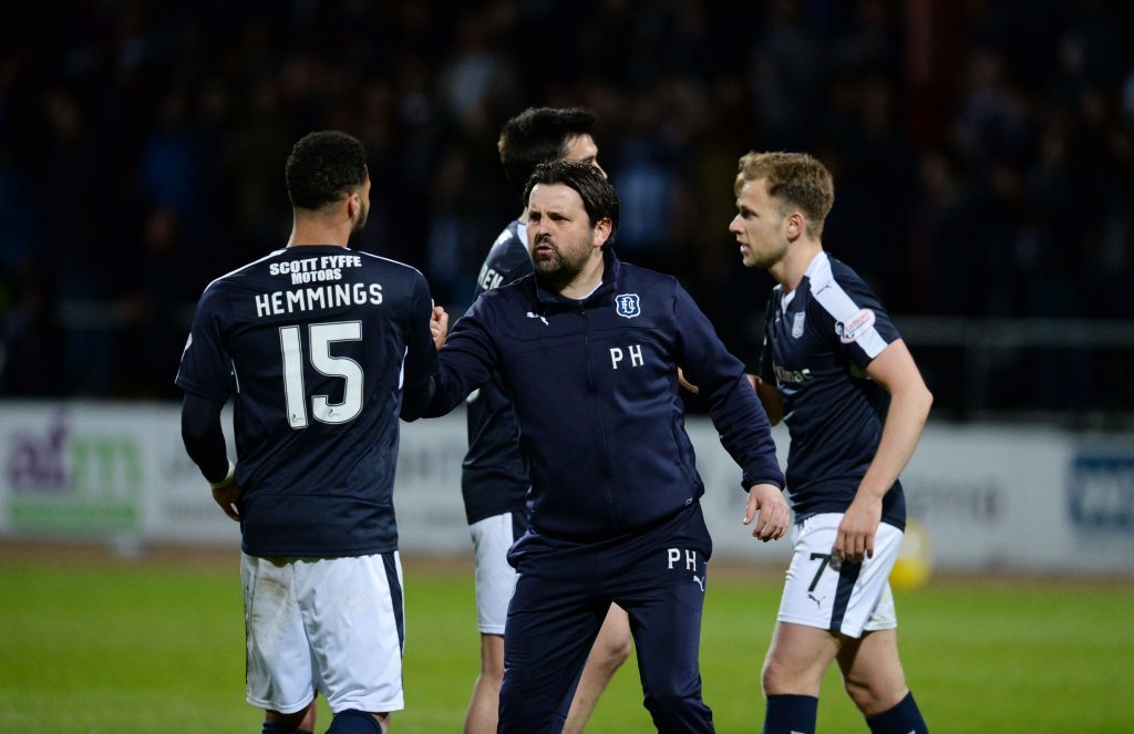 Dundee celebrate at full-time.