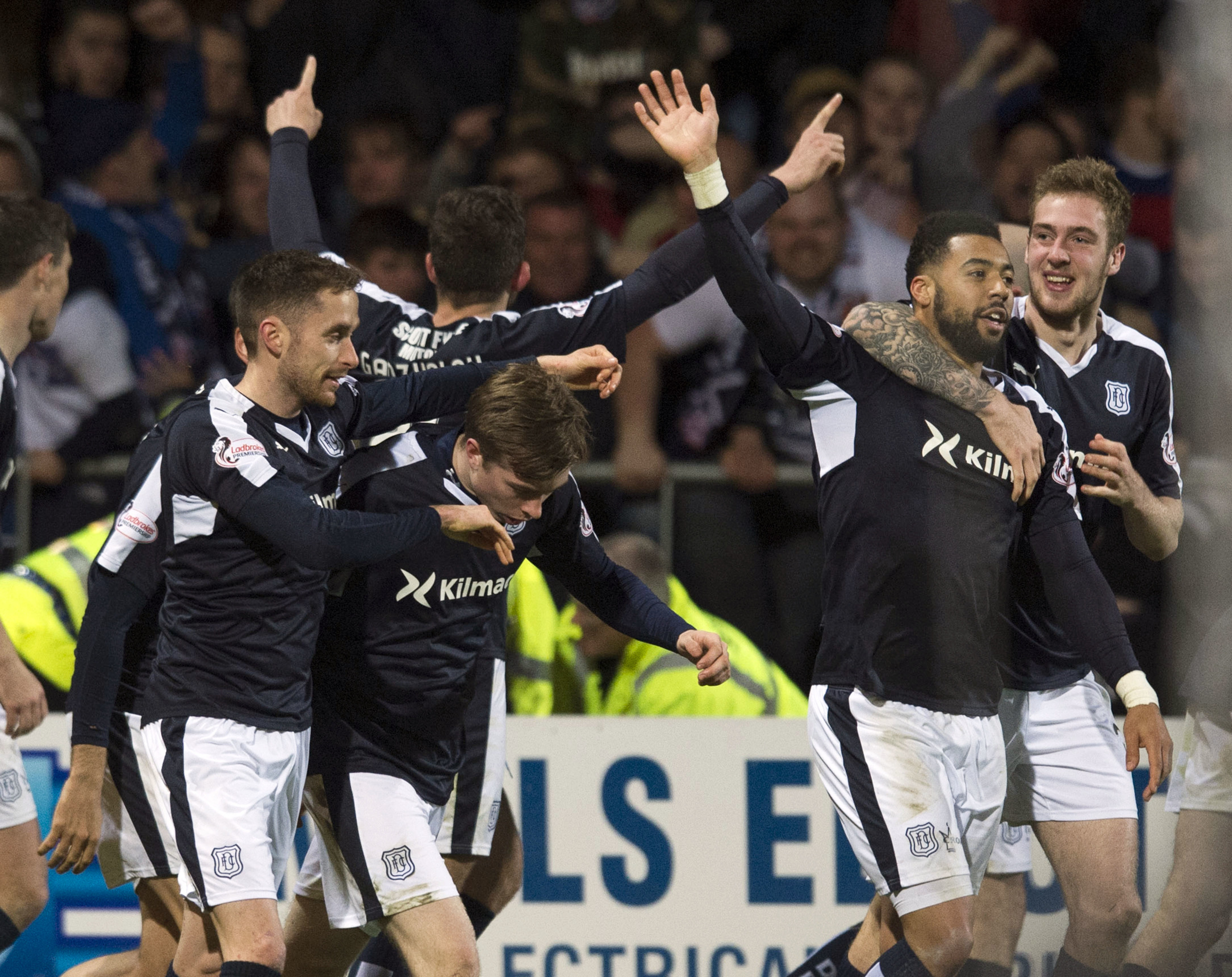 Craig Wighton is hailed after scoring the winner against Dundee United.