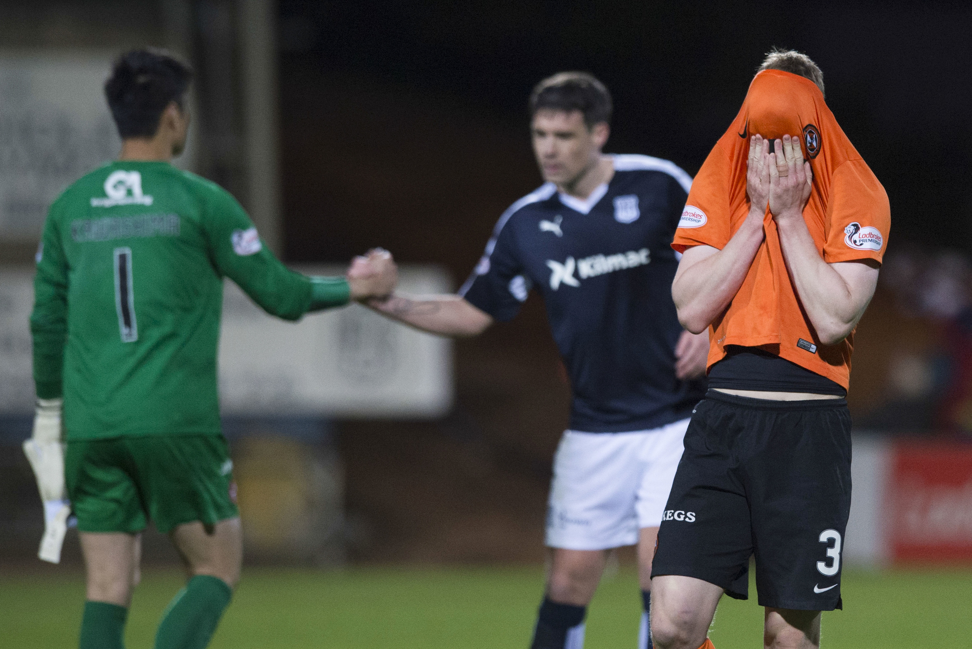 Dundee United's Paul Dixon is devastated at the final whistle.