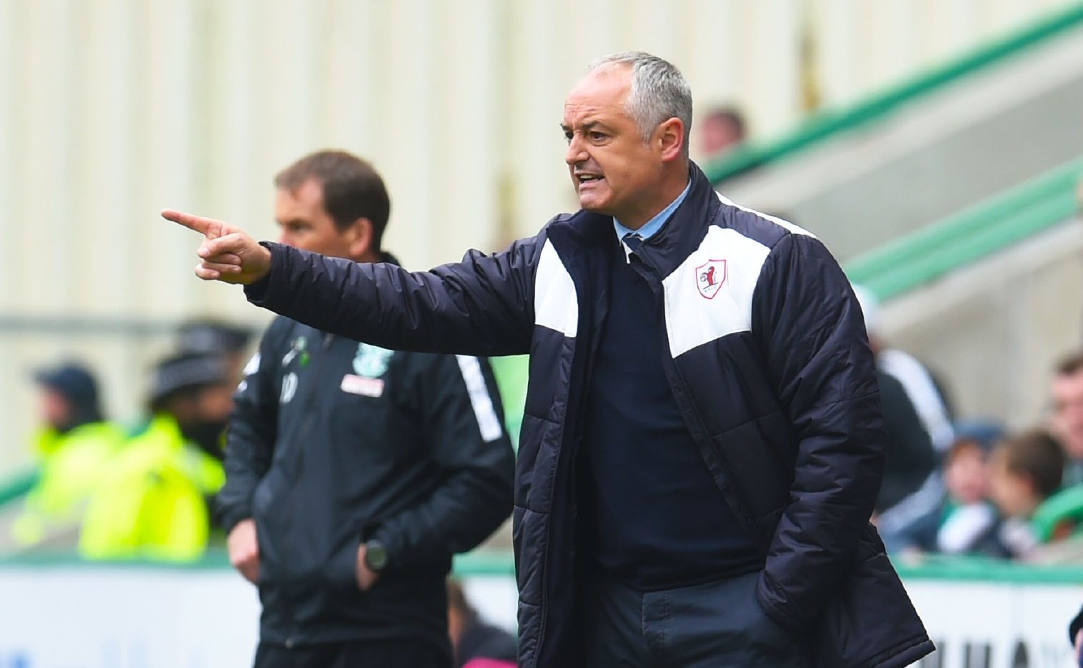 Ray McKinnon sends instructions to the Raith players at Easter Road.