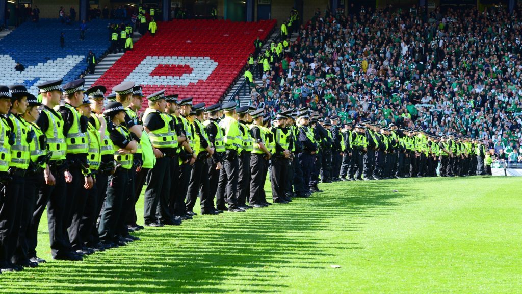 21/05/16 WILLIAM HILL SCOTTISH CUP FINAL RANGERS v HIBERNIAN HAMPDEN - GLASGOW Police line up across the pitch to push back the Hibernian supporters.