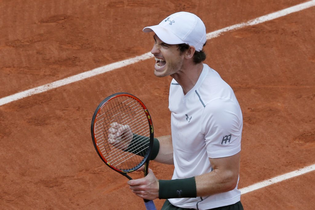 Britain's Andy Murray celebrates winning his third round match of the French Open tennis tournament against Croatia's Ivo Karlovic at the Roland Garros stadium in Paris, France, Friday, May 27, 2016. (AP Photo/Christophe Ena)