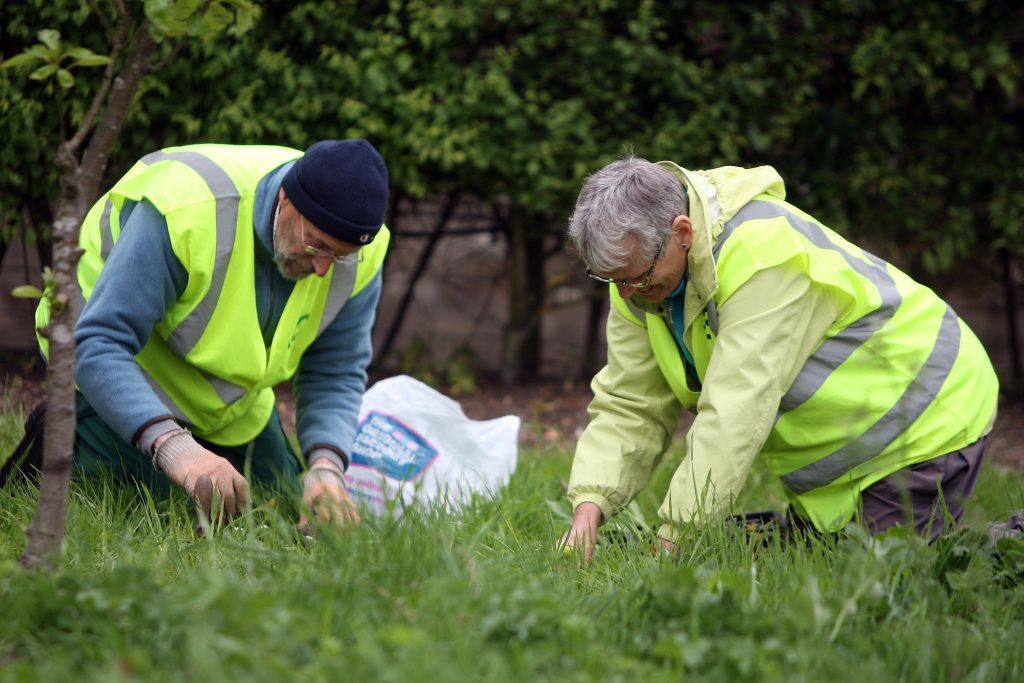 Sustainable Cupars Sarah Davidson right) plantng wildflowers at the orchard off Millgate