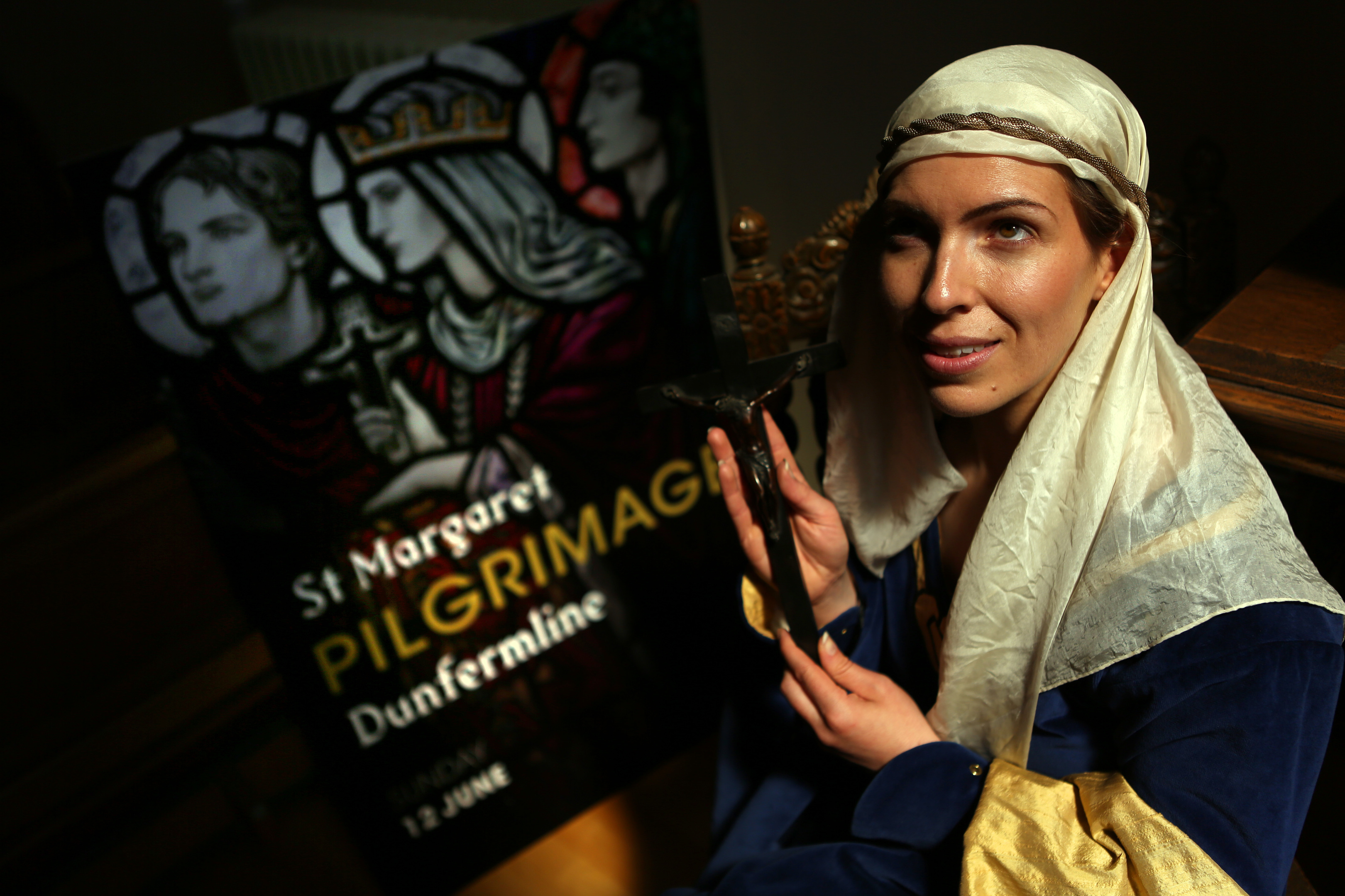 Katie Milne as St Margaret promoting the summer pilgrimage.