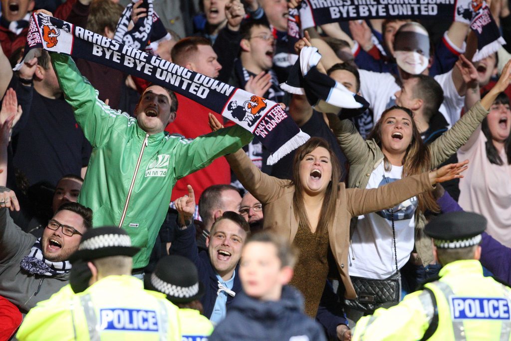 Dundee fans celebrate victory over city rivals United at Dens Park on May 2 - a result that confirmed the Tannadice clubs relegation