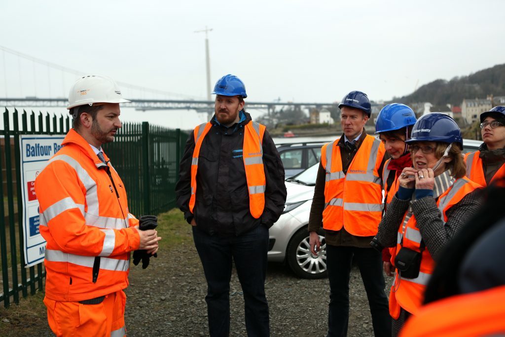 International journalists receive a safety briefing from Netowkr Rail senior communications manager Craig Bowman (left) before scaling the Forth Rail Bridge. The Courier's Michael Alexander is third from left.