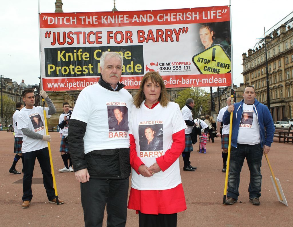 Dad Alan McLean and mum Tina McLean during a 'Justice for Barry' march in Glasgow