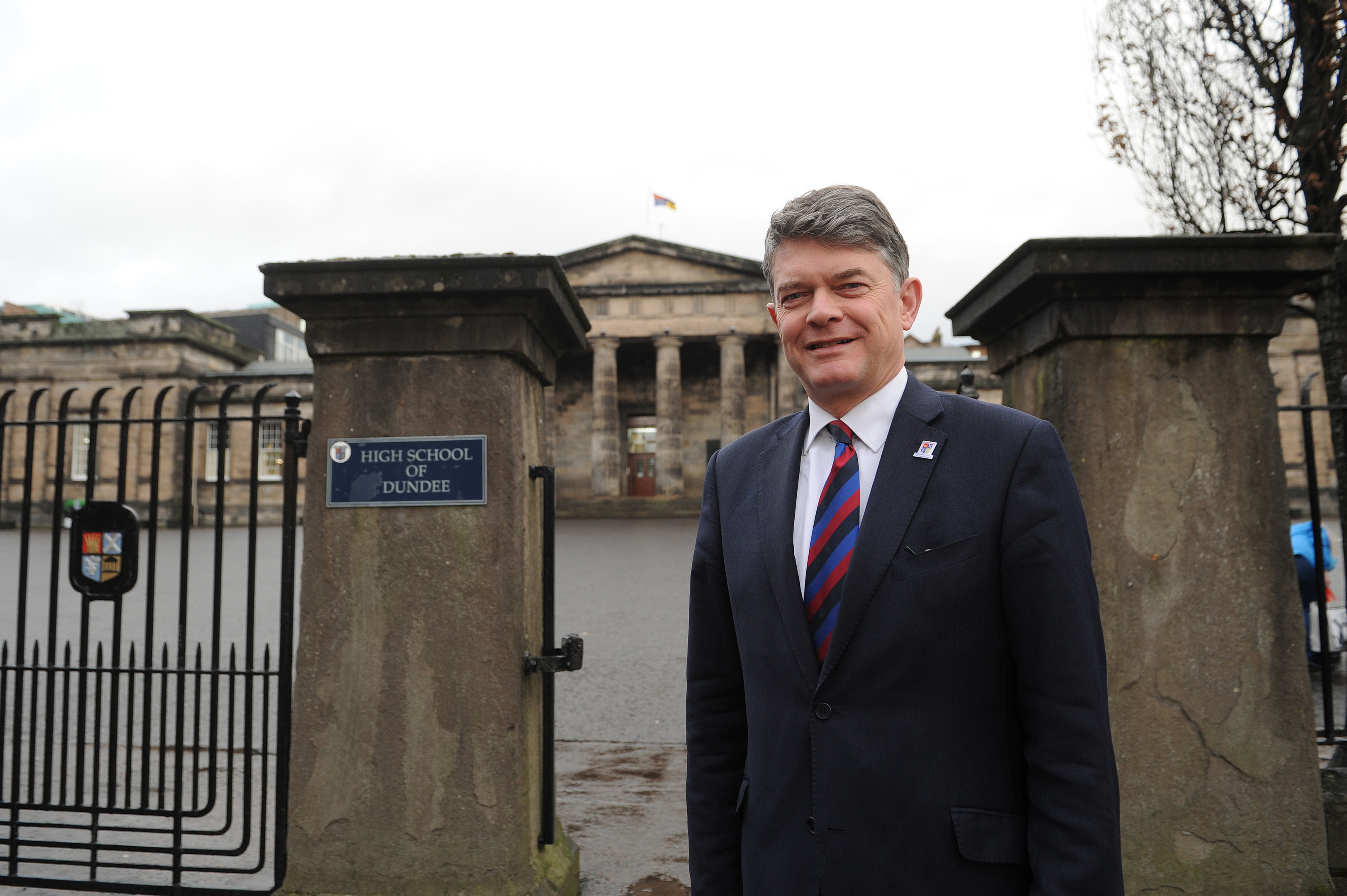 Dr John Halliday outside the High School of Dundee in Euclid Crescent.