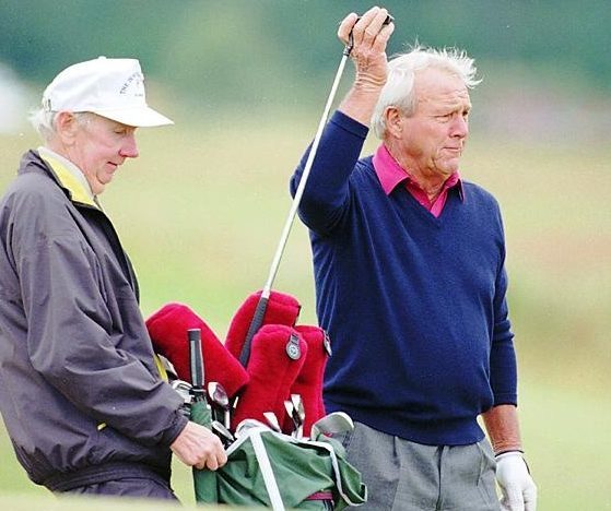 Arnold Palmer at the 1995 Open Championship in St Andrews with faithful caddie Tip Anderson.