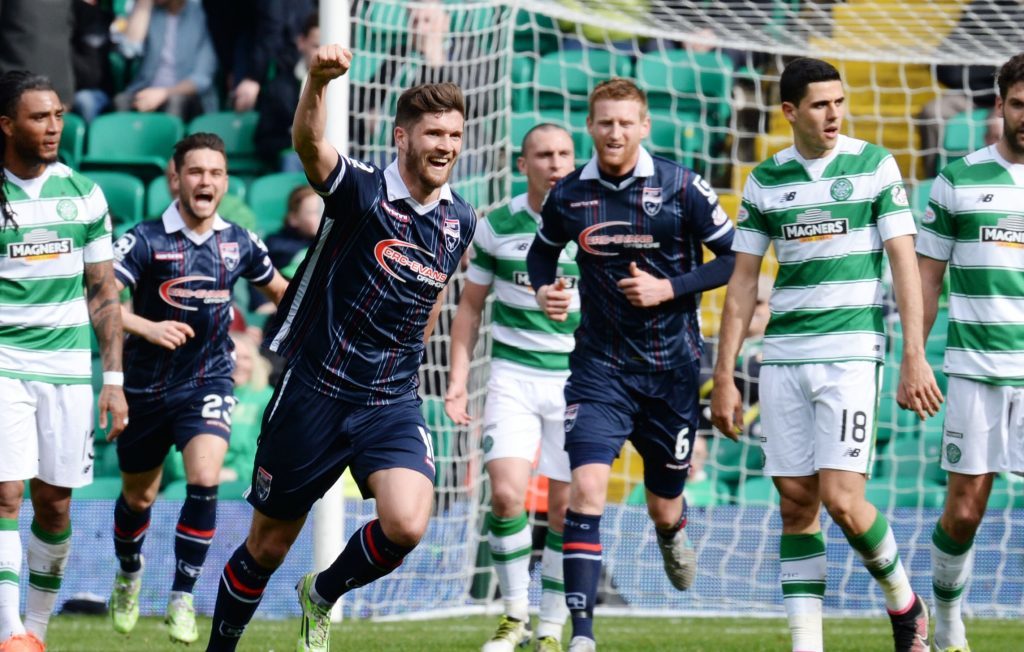 Stewart Murdoch celebrates as he scores an equaliser against Celtic for Ross County.