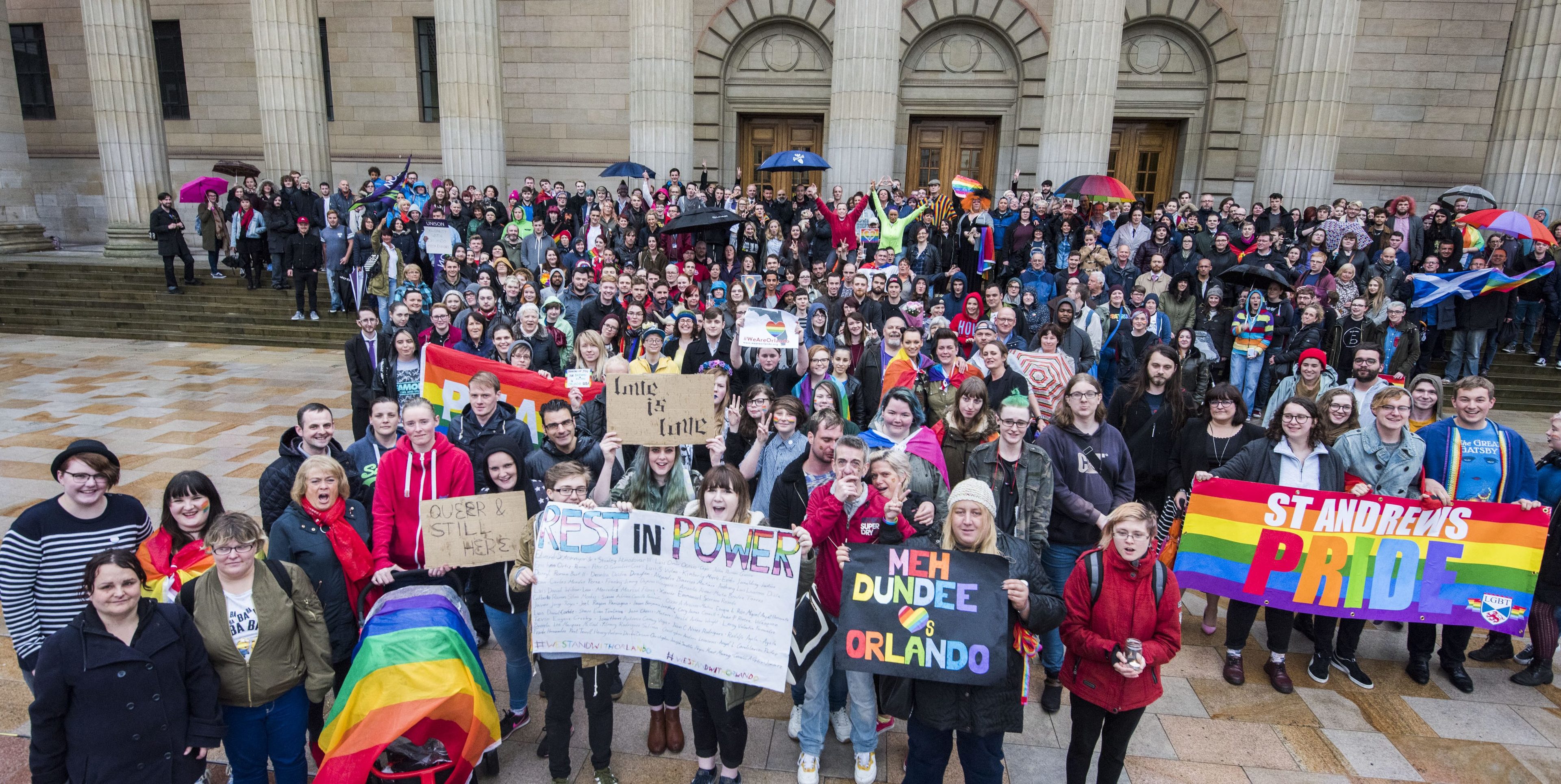 Around 300 stood in silence, lit candles and cast flowers into the fountains. Messages of support were also left at the top of the Caird Hall steps.