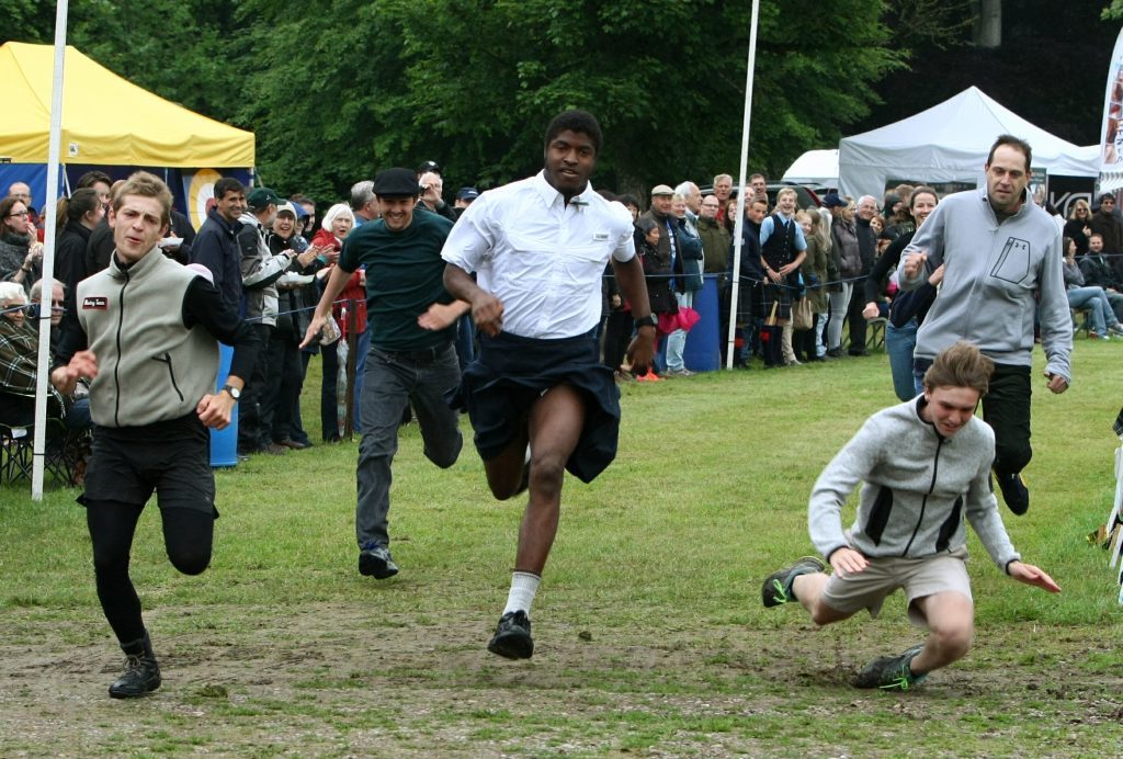 One runner takes a tumble in the Men's International Race.