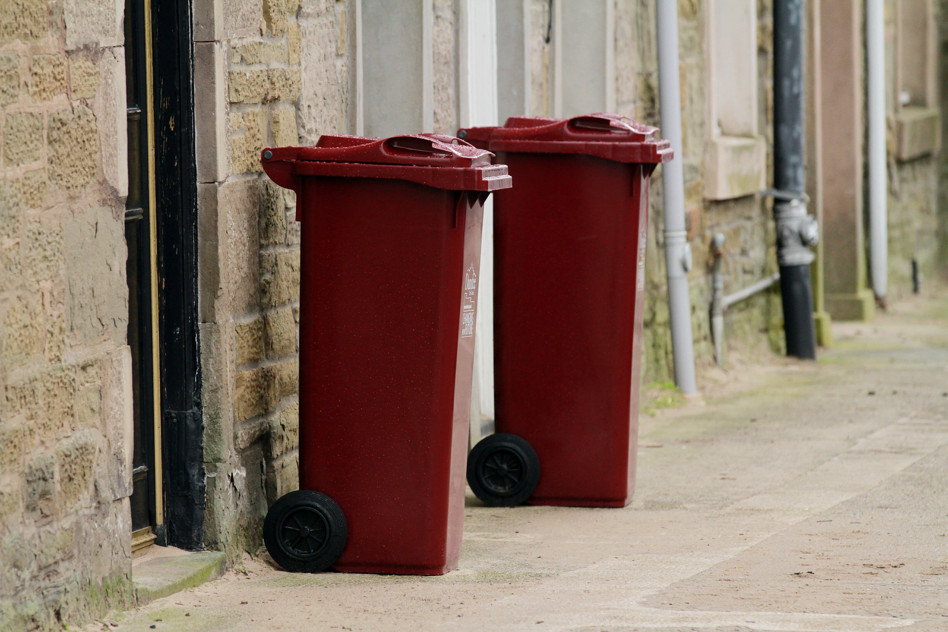 The roll-out of burgundy glass recycling bins was only one-third complete but will now be abandoned as part of the changes being implemented by Dundee City Council.