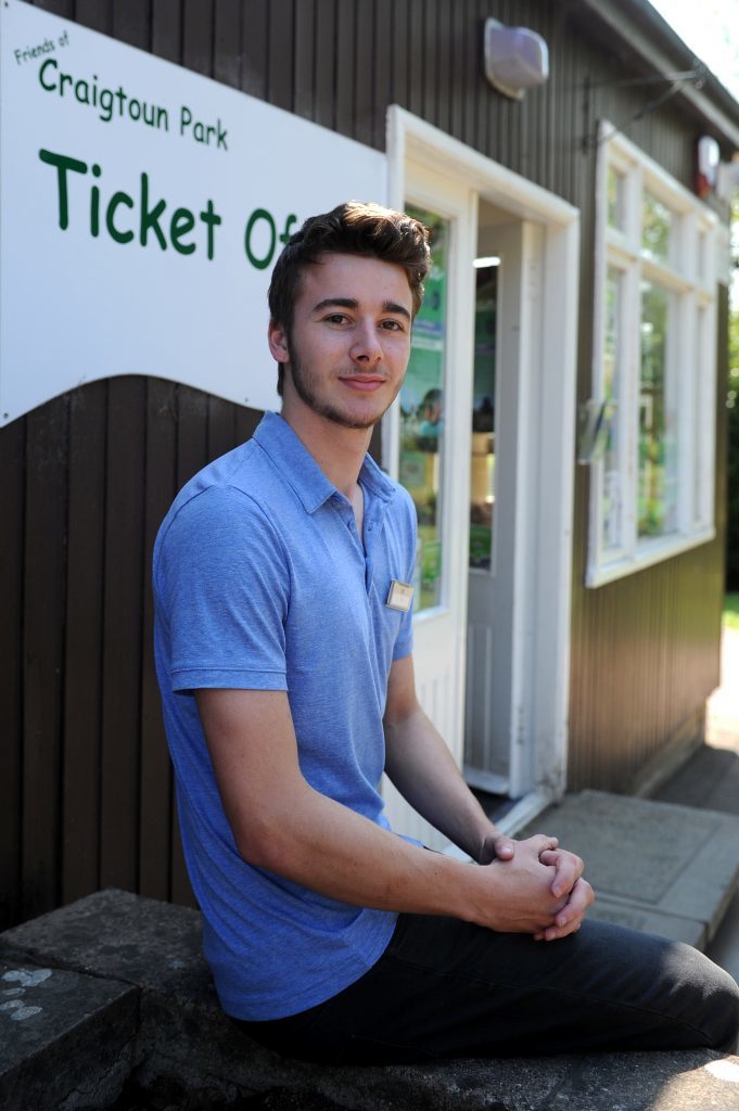 Jed Watson working at the ticket office