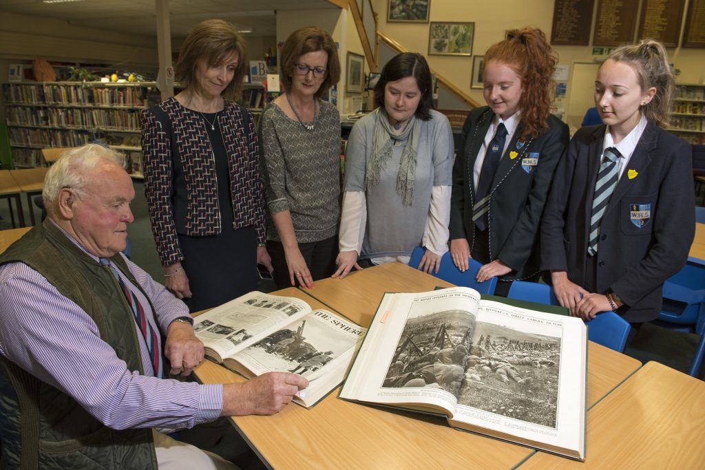 Mr Laird with Webster's staff members and S6 pupils Amber Ogg and Robyn Laird. 