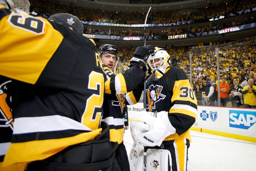 Pittsburgh Penguins  Matt Murray celebrates with his teammates.