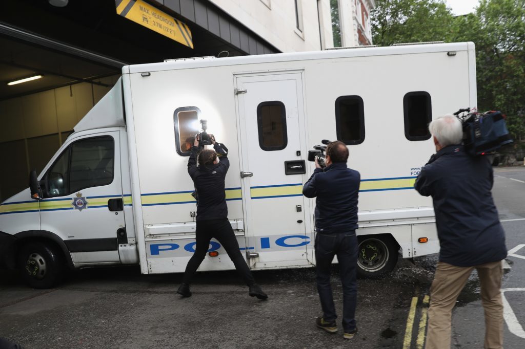 A police van believed to be carrying Thomas Mair arrives under police escort to Westminster Magistrates Court.