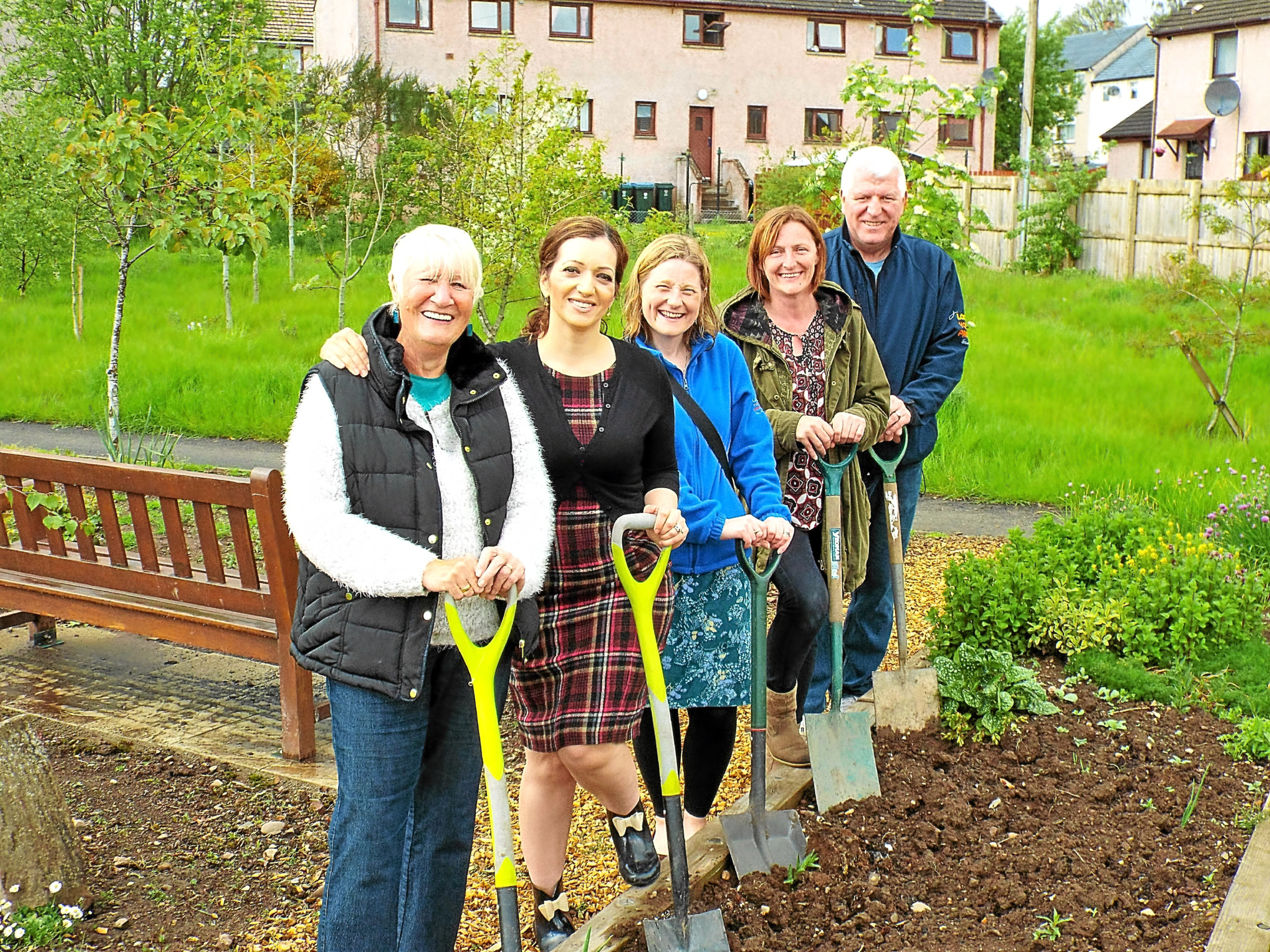 From left - Sally Graham, Tasmina Ahmed-Sheikh MP, Caroline Murphy, Donna McNaughton and Robert McDonald get down to work.