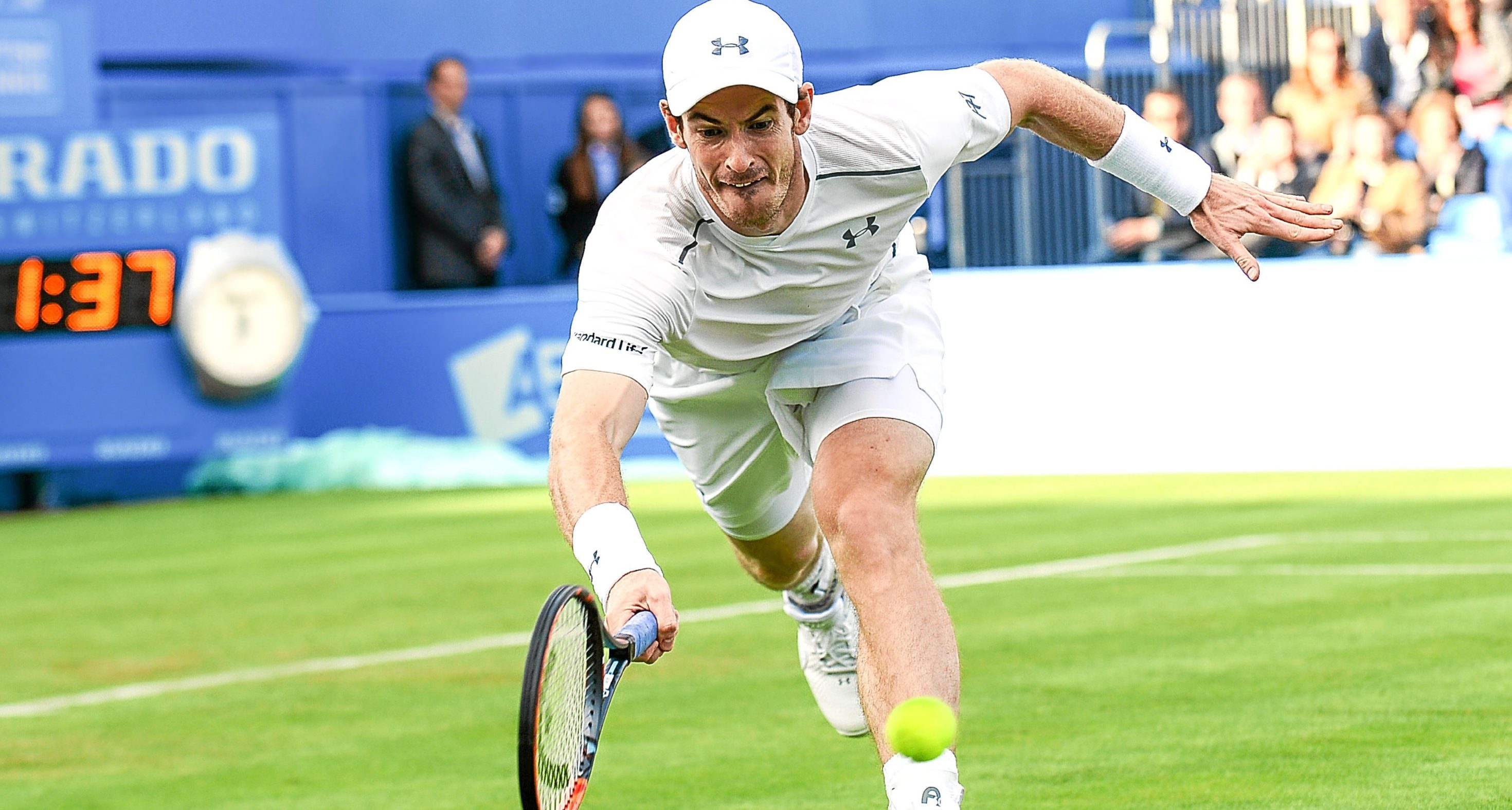 Andy Murray chases after a ball during the match against Nicolas Mahut.