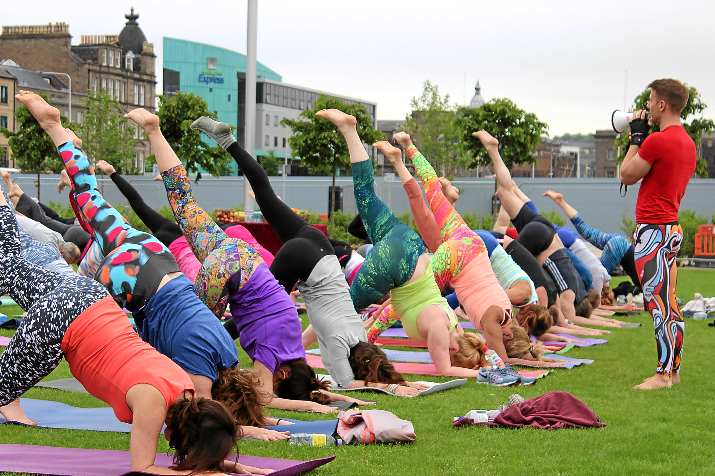 A yoga class in Slessor Gardens.