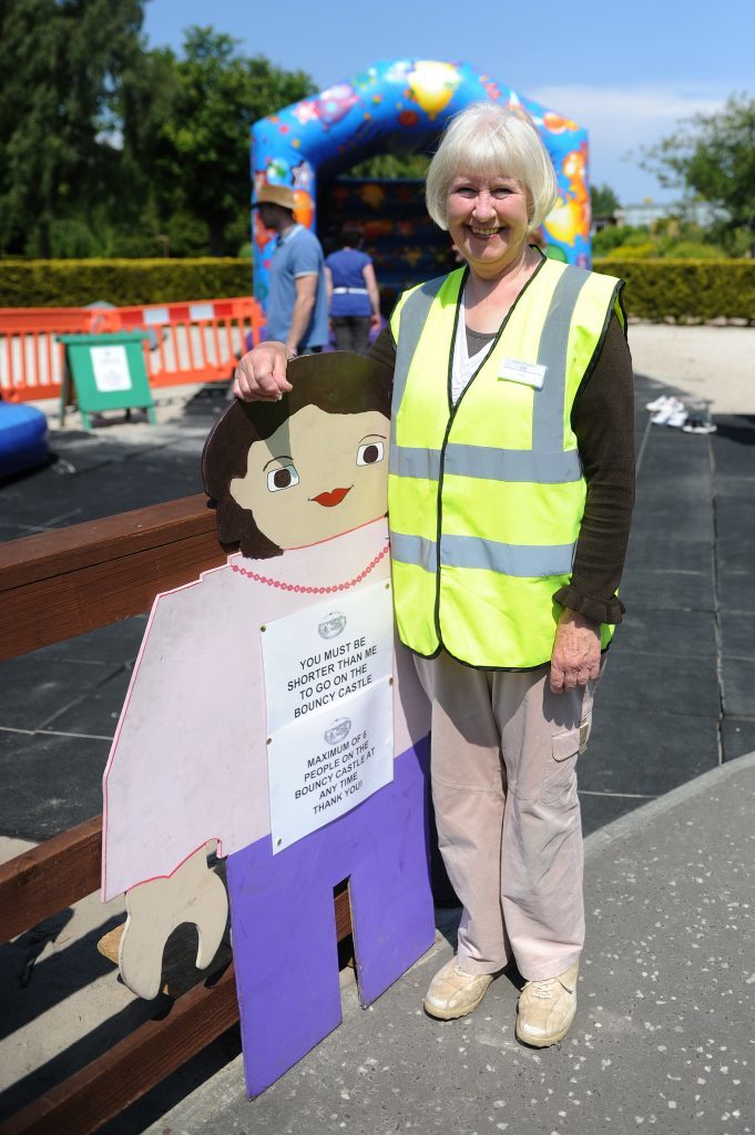 Peggy Rowan supervising the bouncy castles