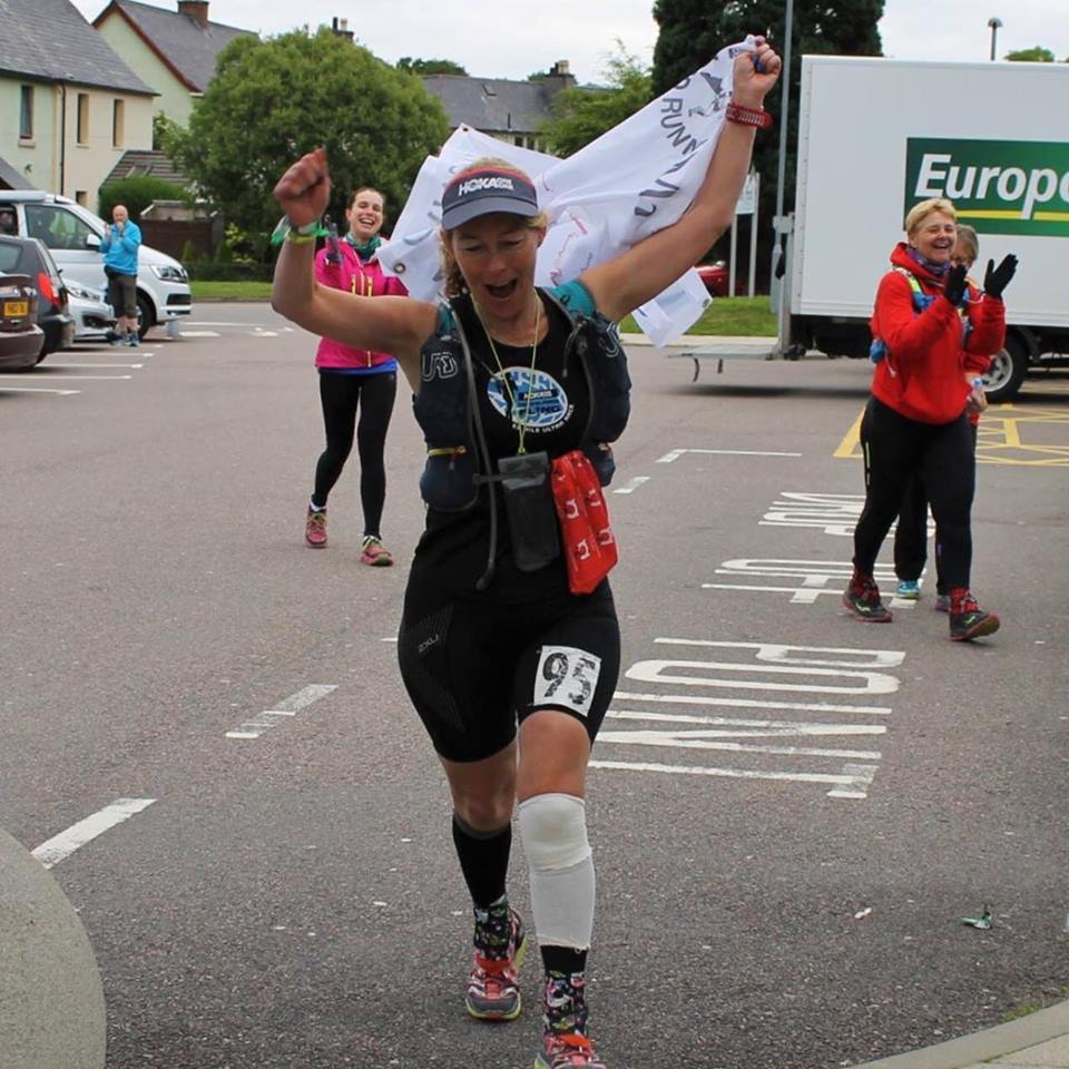 Triumphant Angie crosses the Fort William finish line