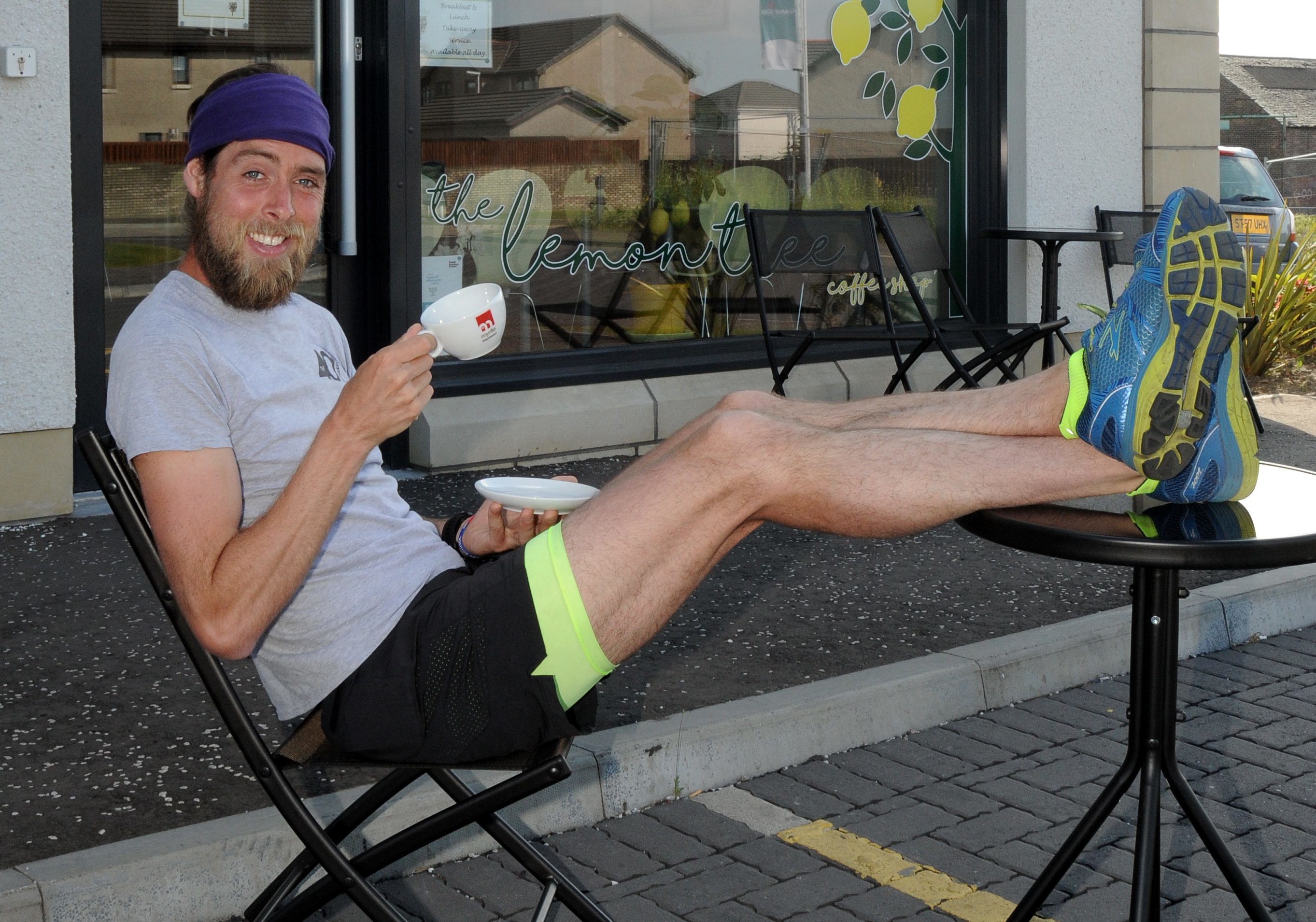 Ben Smith enjoys a pit stop in Leven as he runs 401 marathons in 401 days.