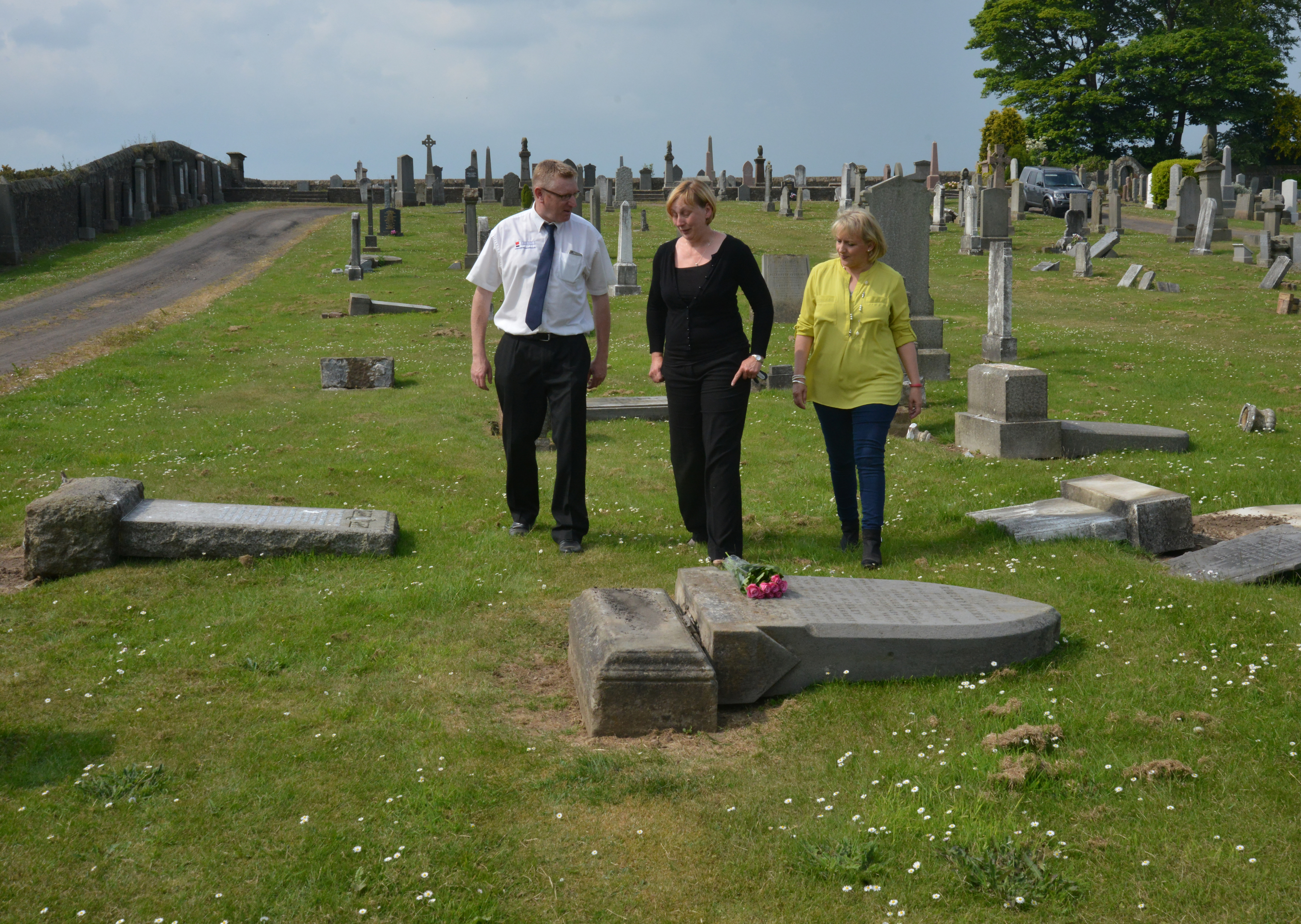 From left: Andrew Forgan, Liz Murphy and Karen Skene at Leslie Cemetery.