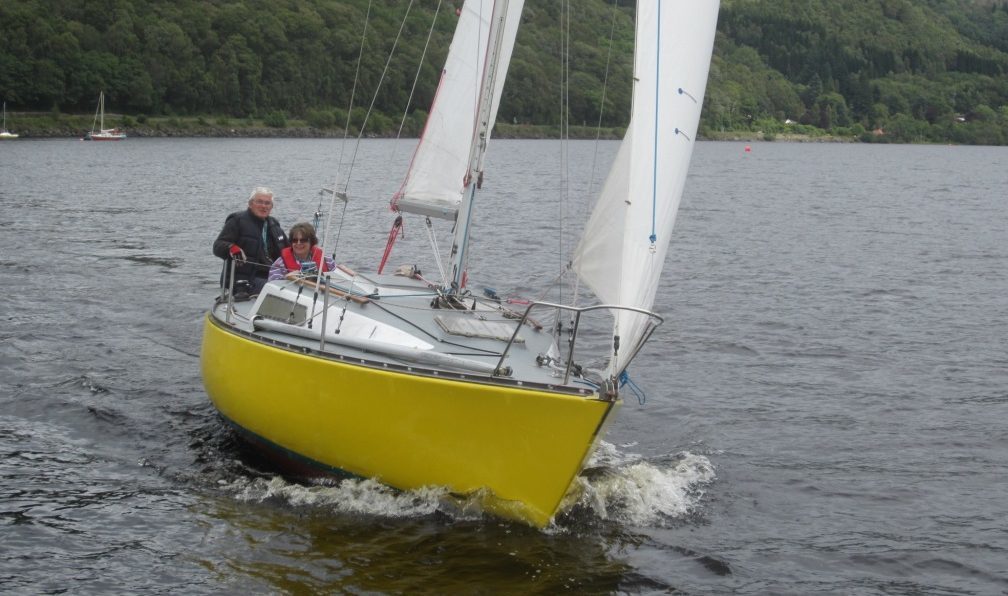 John and his wife aboard the Hooligan