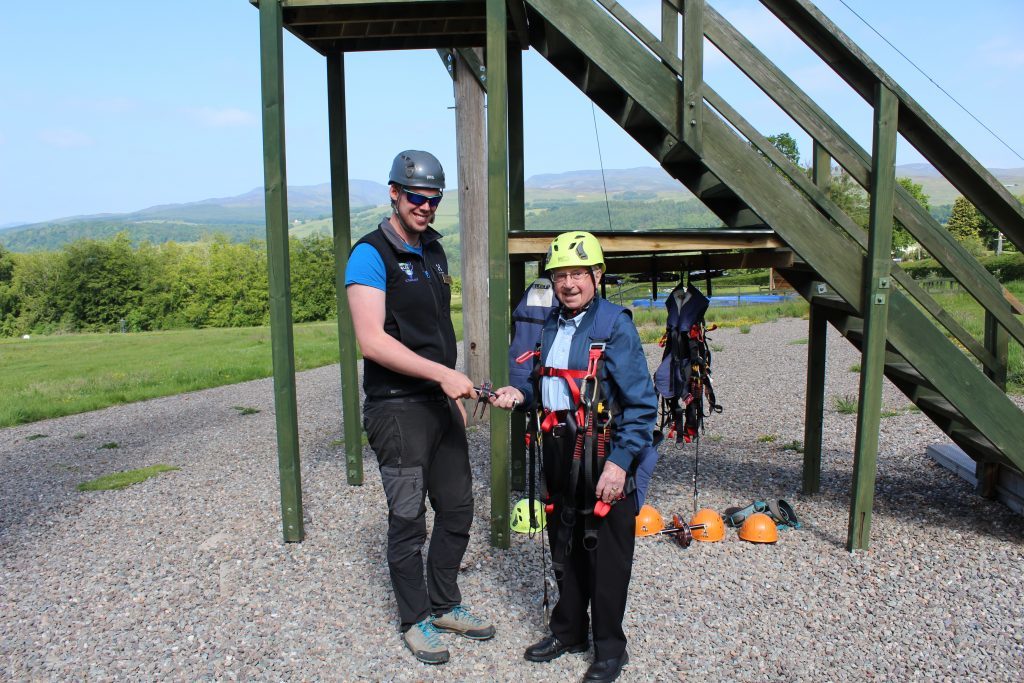 Daniel prepares to go on the zipline.