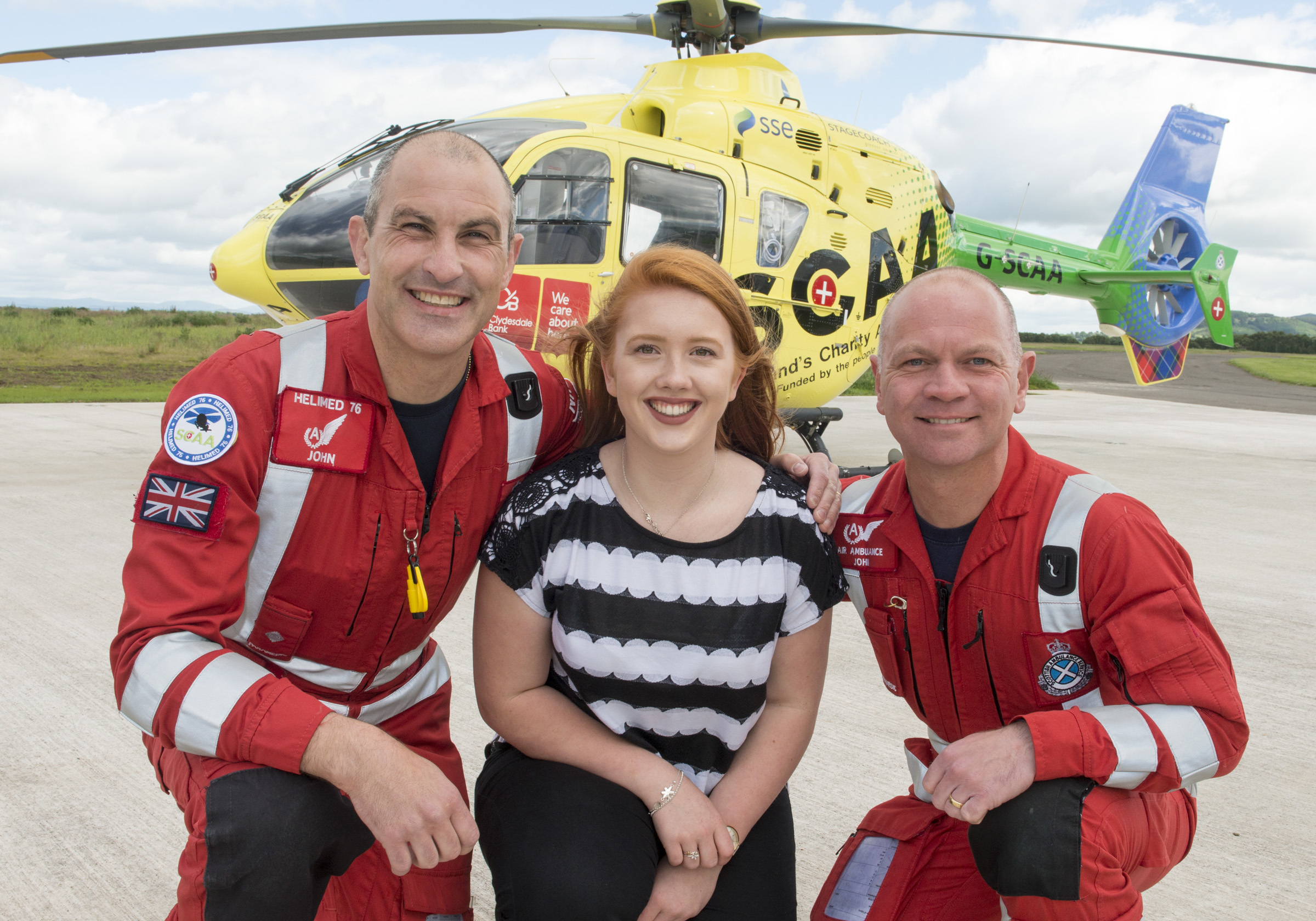 Lucy Smith with paramedics John Pritchard and John Salmond.