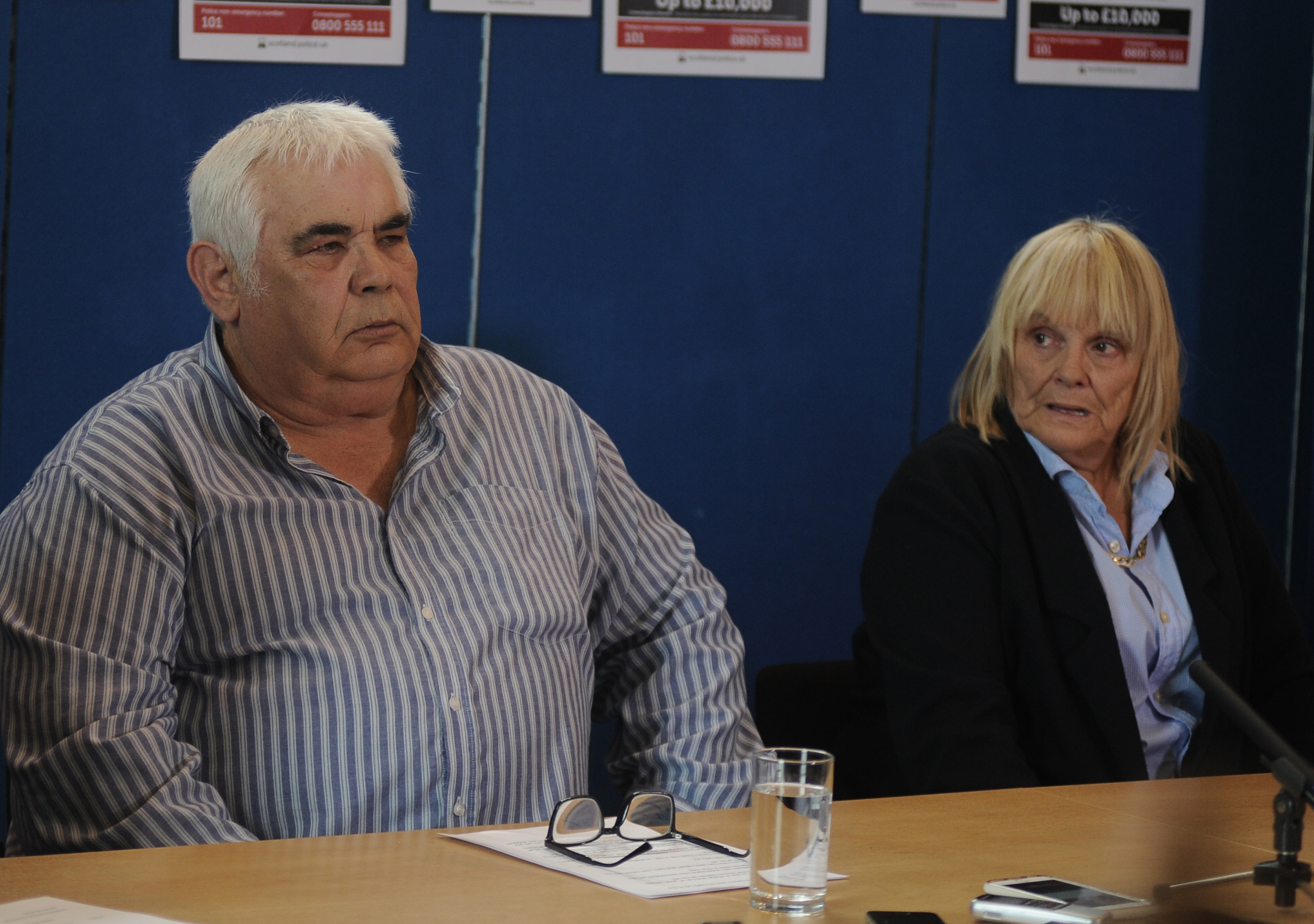 Darren Adie's parents John and Margaret addressing a press conference.