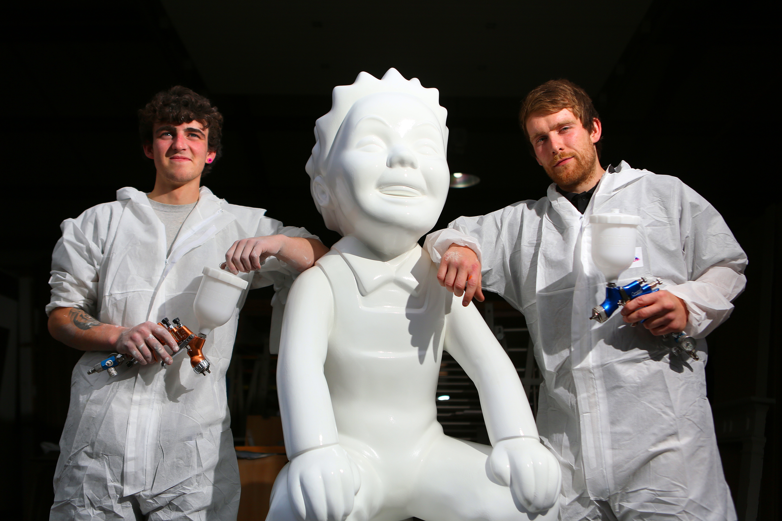 Spray painters, Andrew Mackinnon and Marc Meldrum who painted a lot of the sculptures saying farewell to the final one.