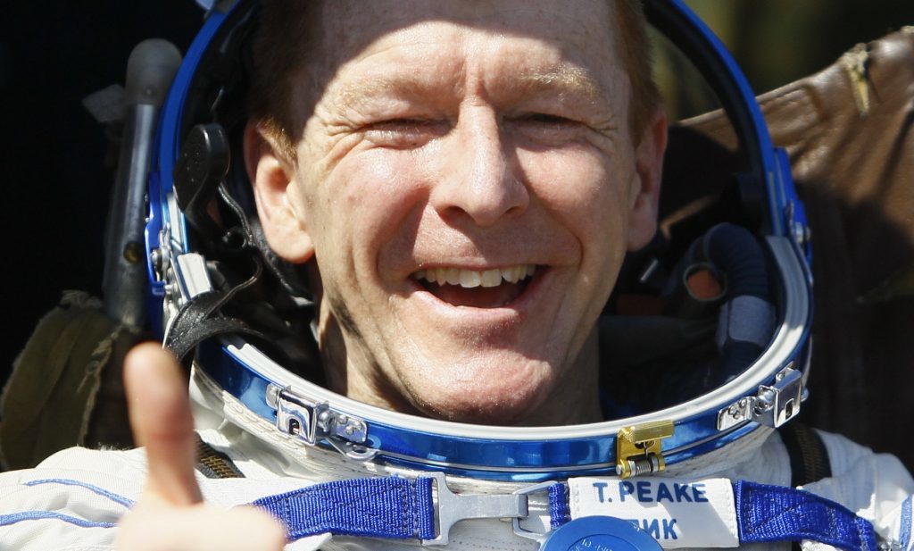 Tim Peake gives a thumbs-up shortly after landing.