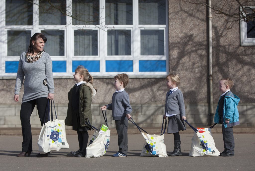 Last year, FareShare joined with RBS and Dundee's Longhaugh Primary School to launch a new food waste initiative, where parents of pupils are invited on a weekly basis to visit the school and take away free shopping parcels. Picture shows Teacher Anne McKinney and pupils Katie-Leigh Buchanan, Daniel Finlayson, Ellie Monks and Kallan Hansen. 