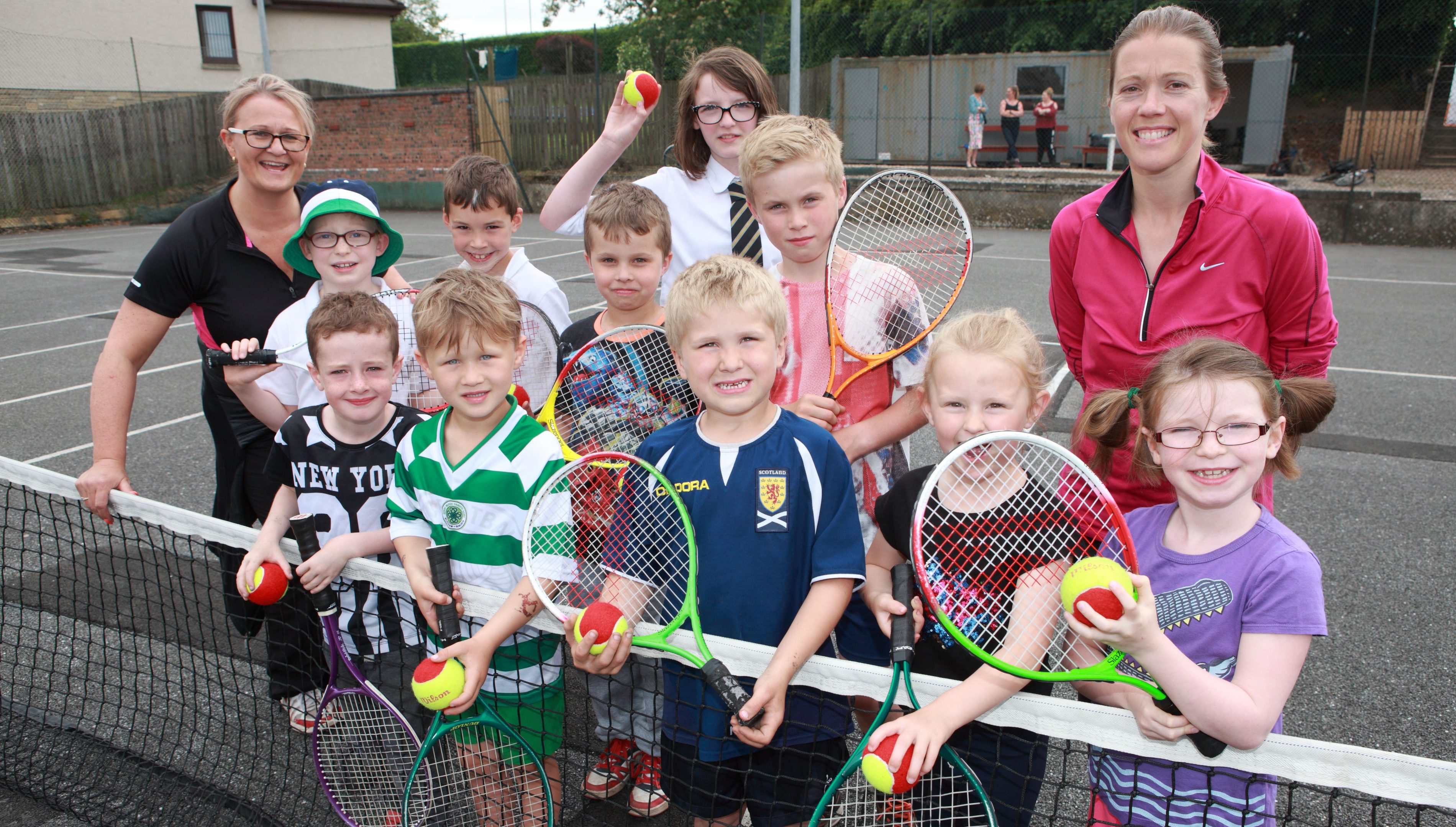 Luncarty players with commitee member Jennifer Poutney (far left) and coach Laura Crimmond.