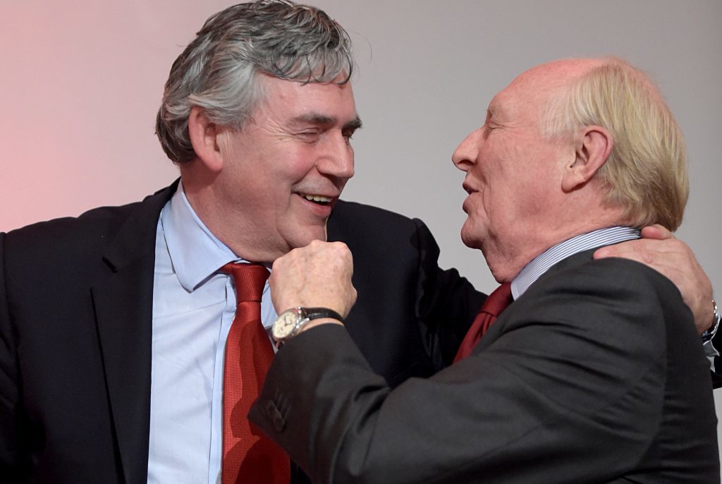 Former Prime Minister Gordon Brown with former Labour leader Neil Kinnock, right, during a Labour Party pro EU rally at the Royal Concert Hall in Glasgow.